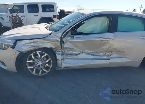 2014 Chevrolet Impala 2Lz z USA, uszkodzony, nr VIN 1G1155S32EU144801